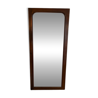 Beveled mirror with wooden contours