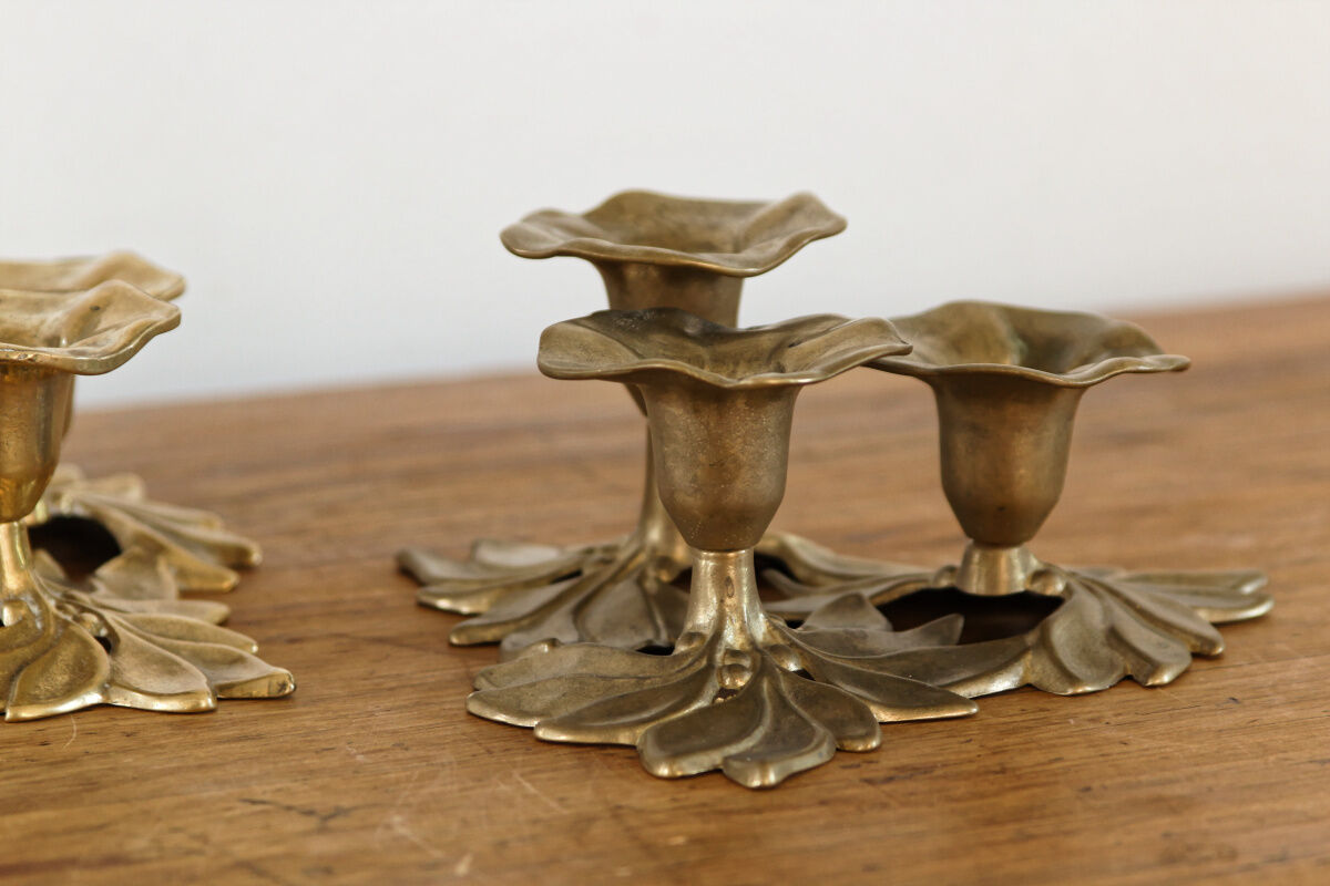 Pair of triple brass candle holders