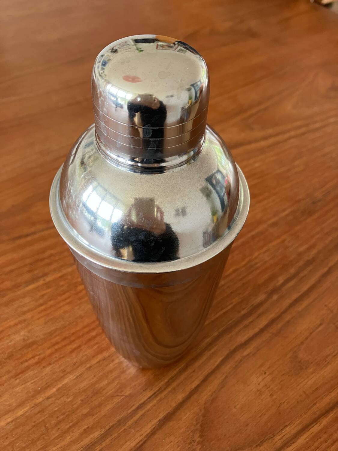 Shaker and five cocktail glasses