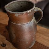 Patinated sandstone pitcher