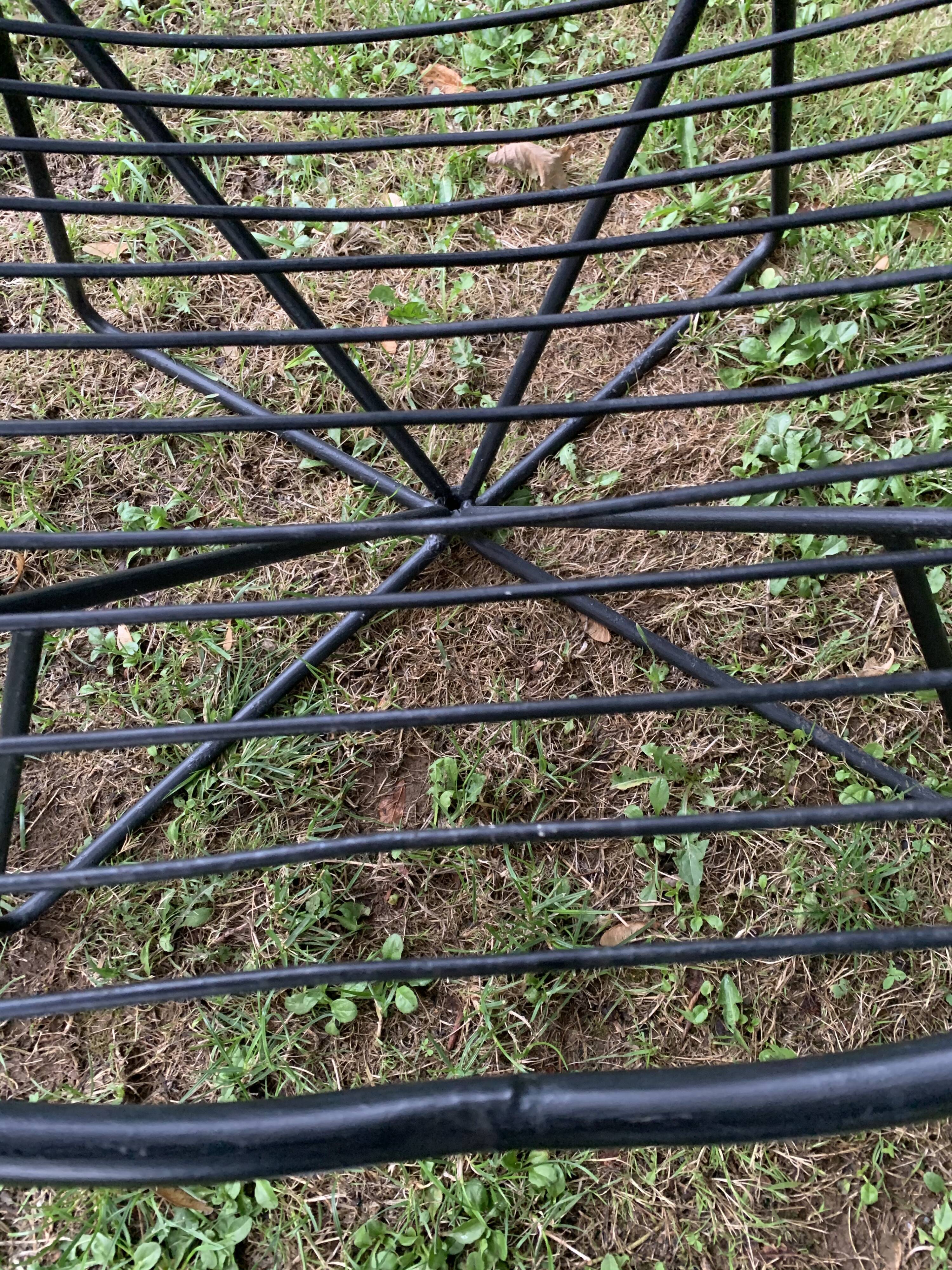 Pair of round chairs in black tubular steel 1960