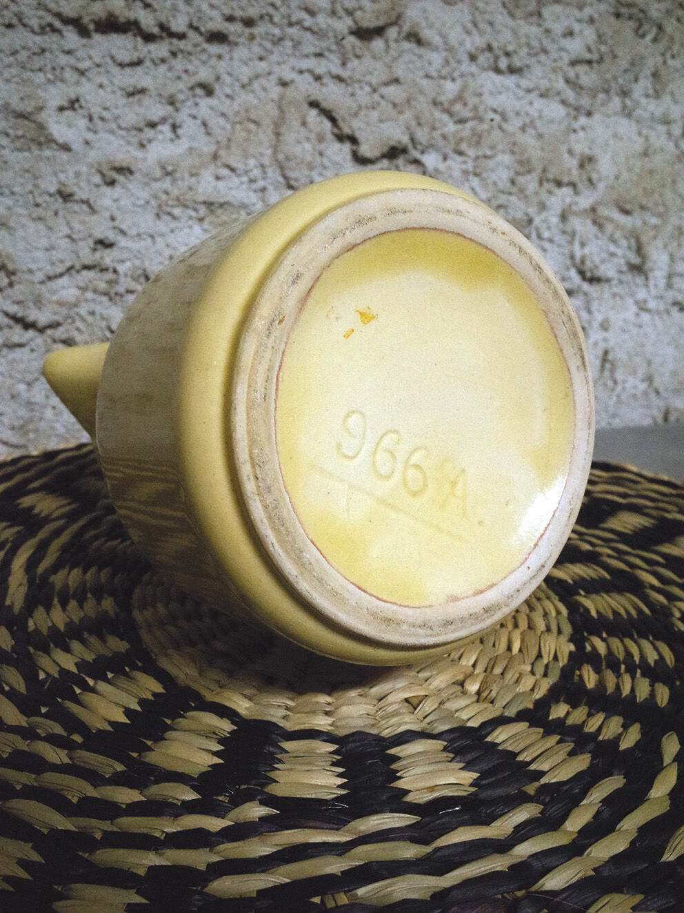 Pastel yellow ceramic pitcher