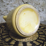 Pastel yellow ceramic pitcher