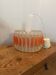 Suspension design Space age in transparent plastic and vintage orange.