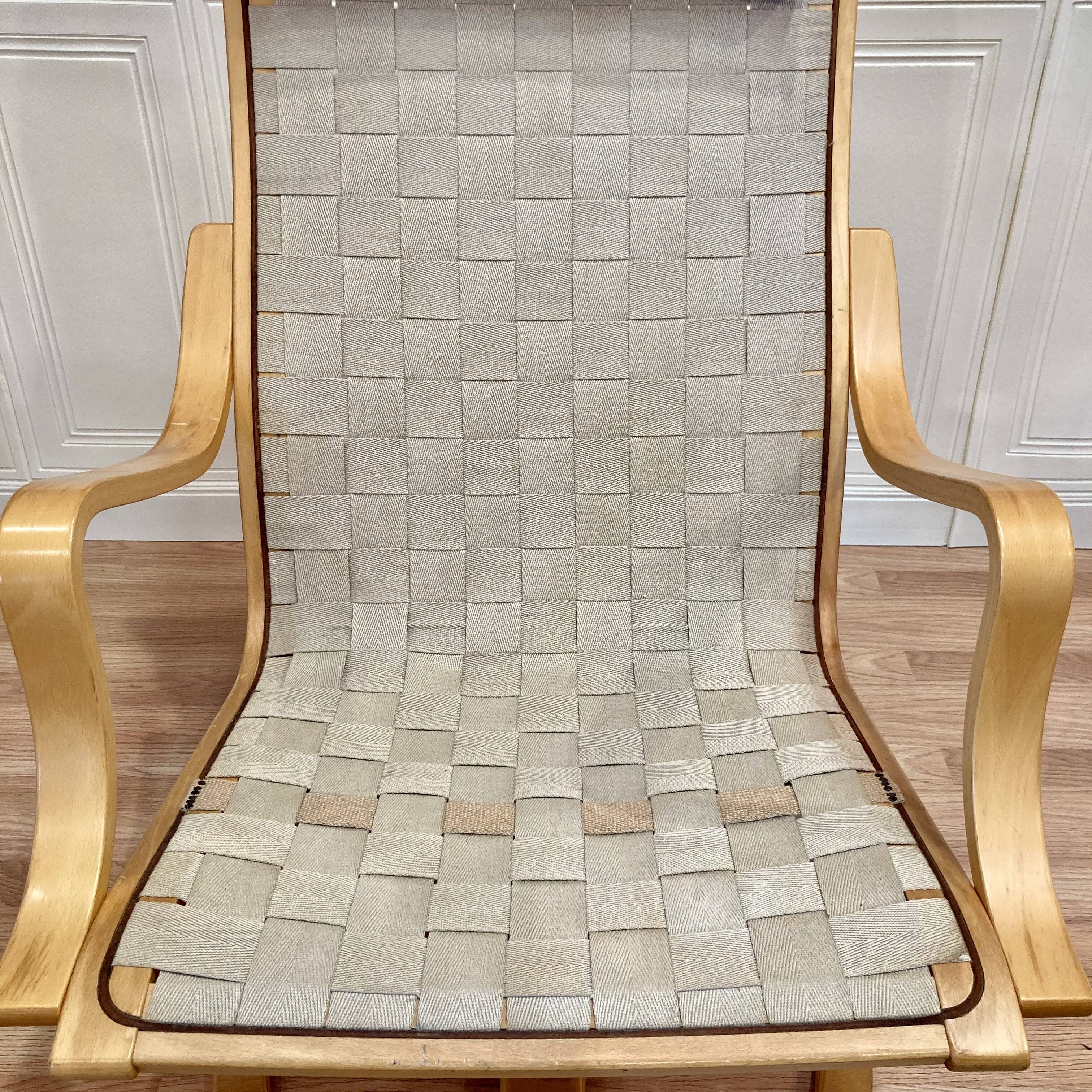 FAUTEUIL ET SON OTTOMAN "DESIGN SCANDINAVE".
