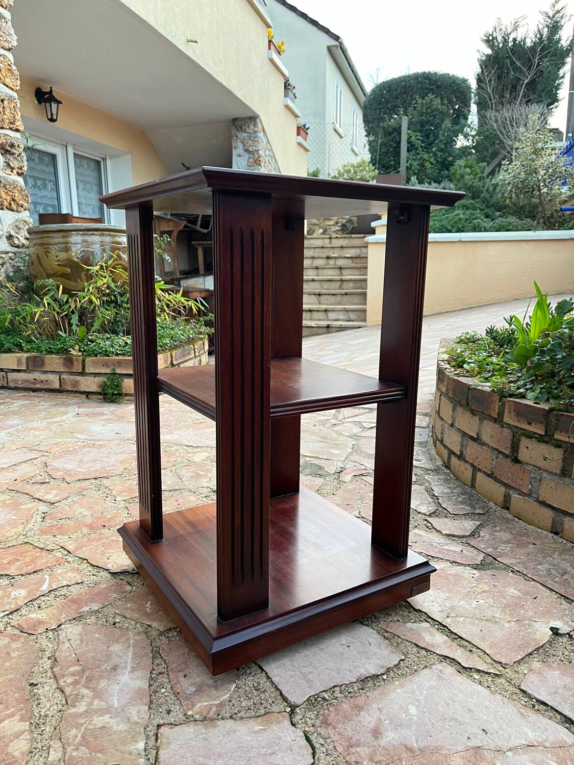 Vintage wooden shelf on caster legs