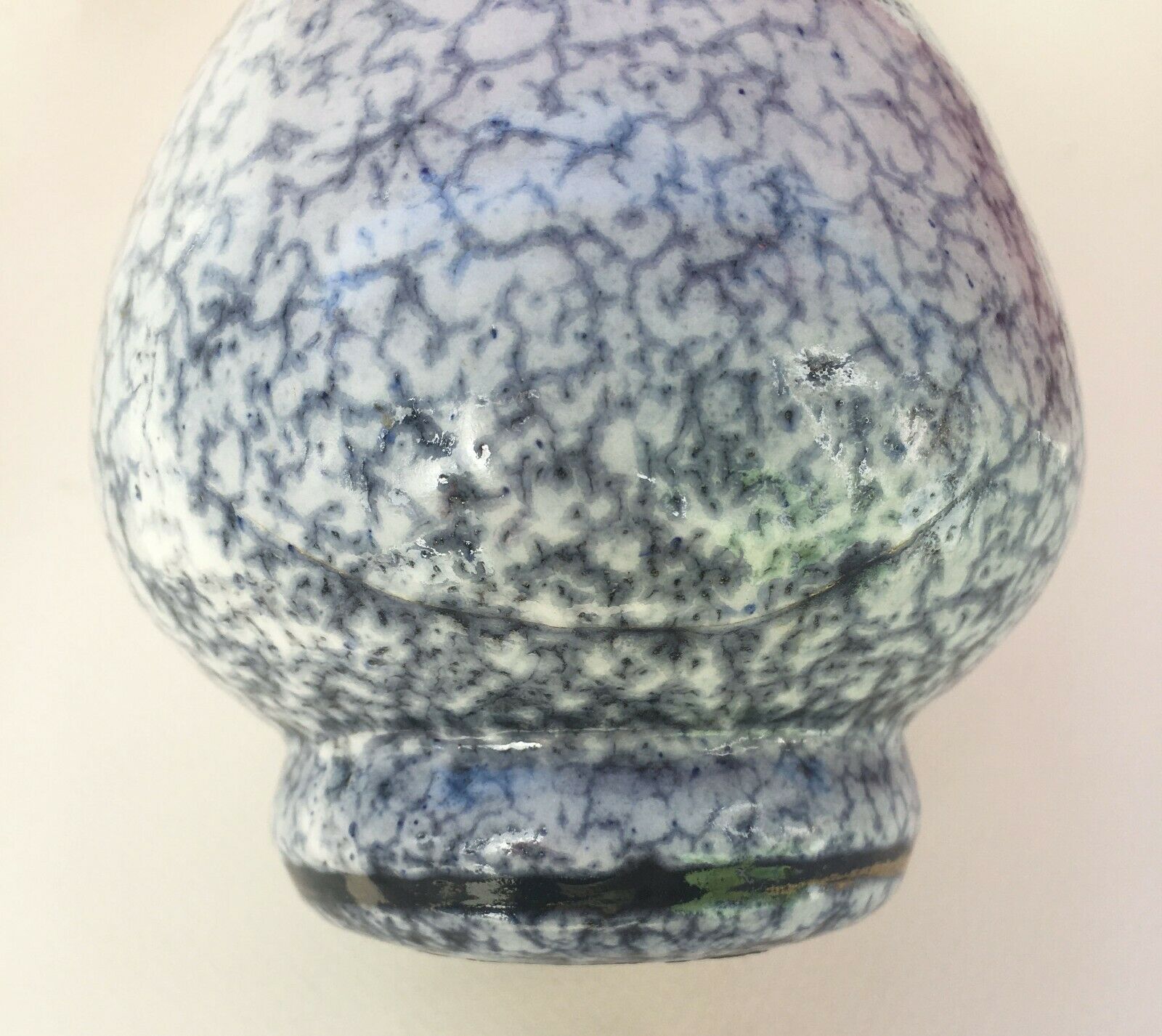 Thick ceramic vase in art deco style