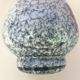 Thick ceramic vase in art deco style