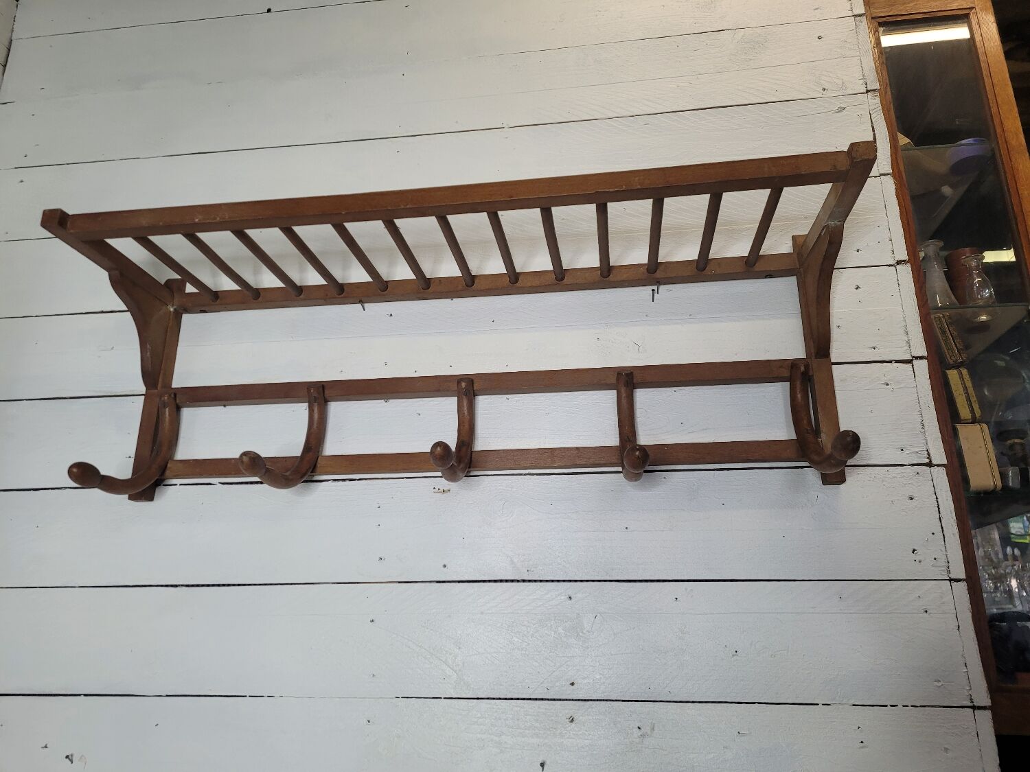 Curved wooden coat rack