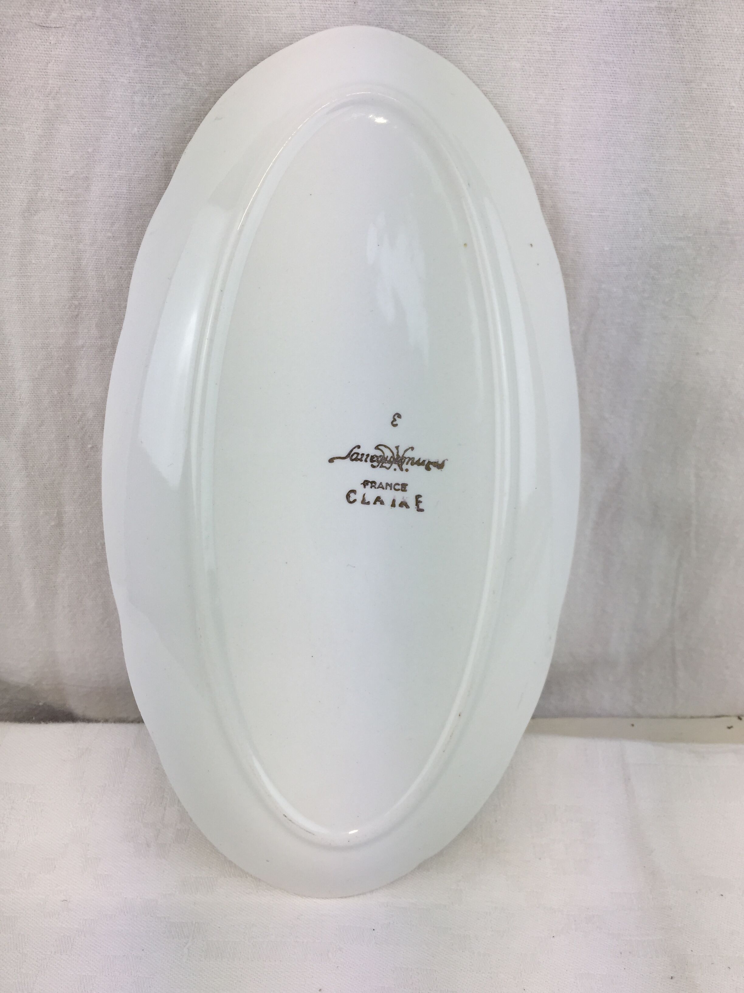 Antique oval shaped white and gold dish made in France Sarreguemines