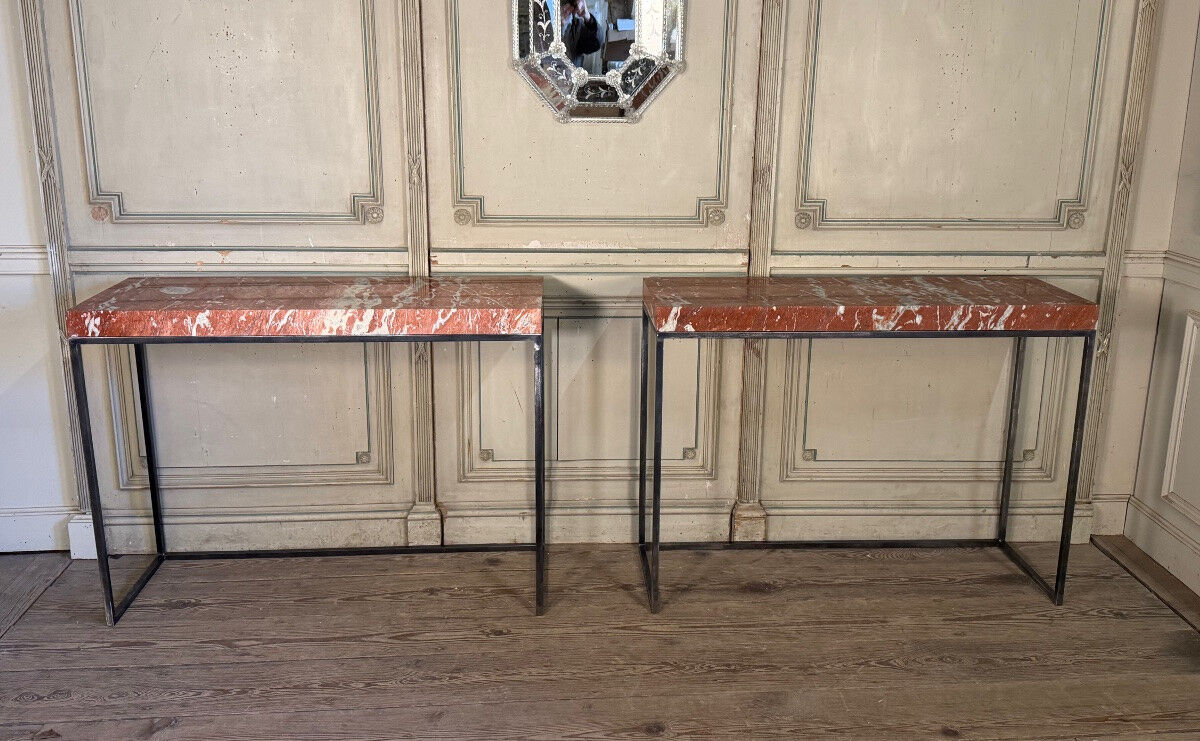 Pair of contemporary consoles in marble and metal.