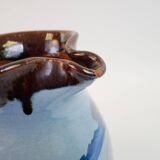 Large blue pitcher with abstract pattern