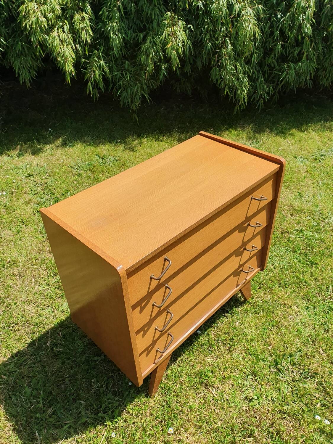 Compass feet chest of drawers