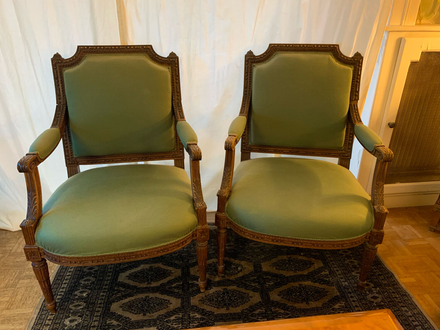 Pair of Louis XVI style armchairs in solid walnut