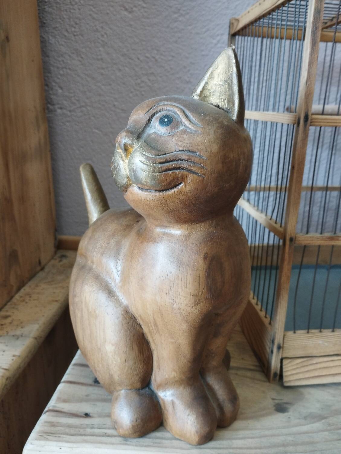 Wooden cat sculpture