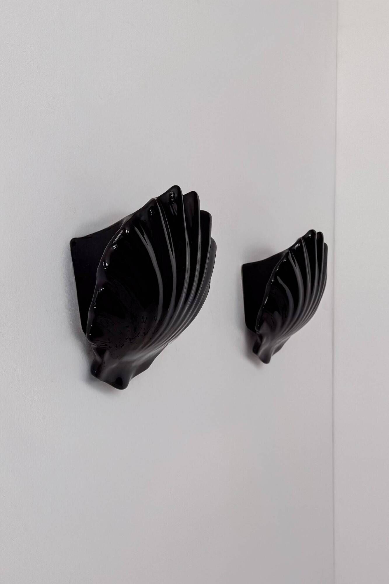 Pair of vintage wall lights in black porcelain, France 1970.