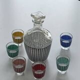 Liquor service consisting of a carafe and 6 small shot glasses, houndstooth pattern