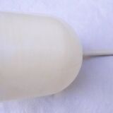 Glass suspension forming a bulb.