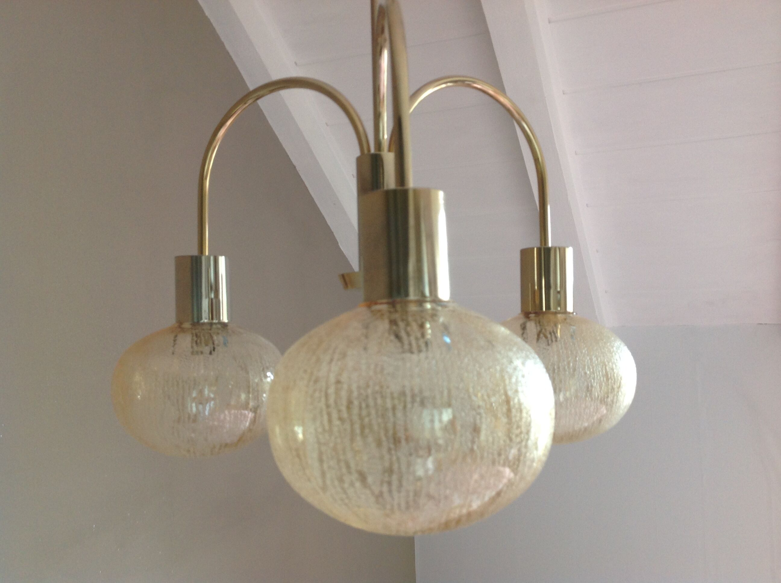 Three-globe brass chandelier in amber/vintage glass 60s-70s