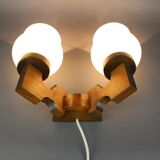 Czechoslovak wall lamp from the 1960s with Valasske Mezirici glass and a wooden base.