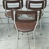 3 Chaises en skaï marron chocolat des années 1960-1970, estampillées.