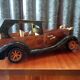 Toy car made of varnished wood