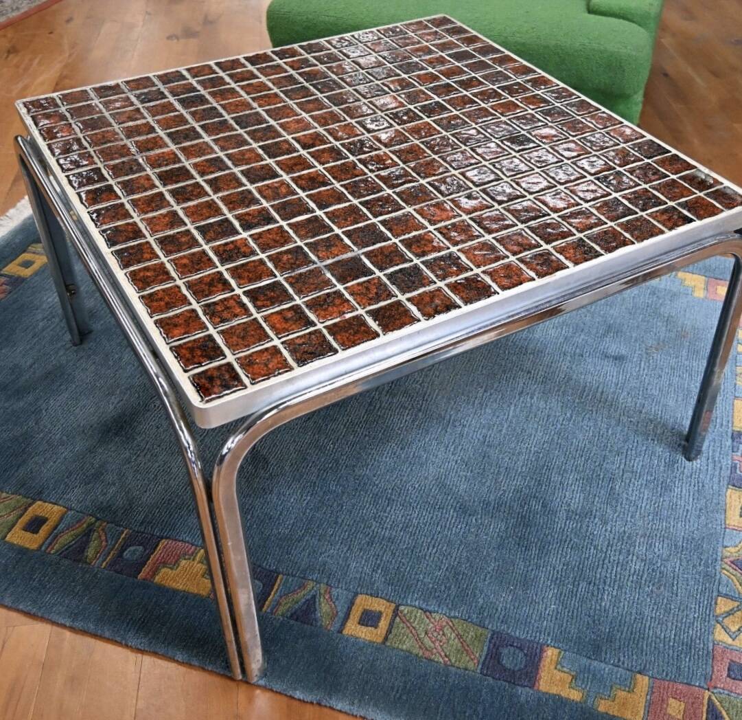 Vintage square coffee table with chrome legs and small tiled squares.