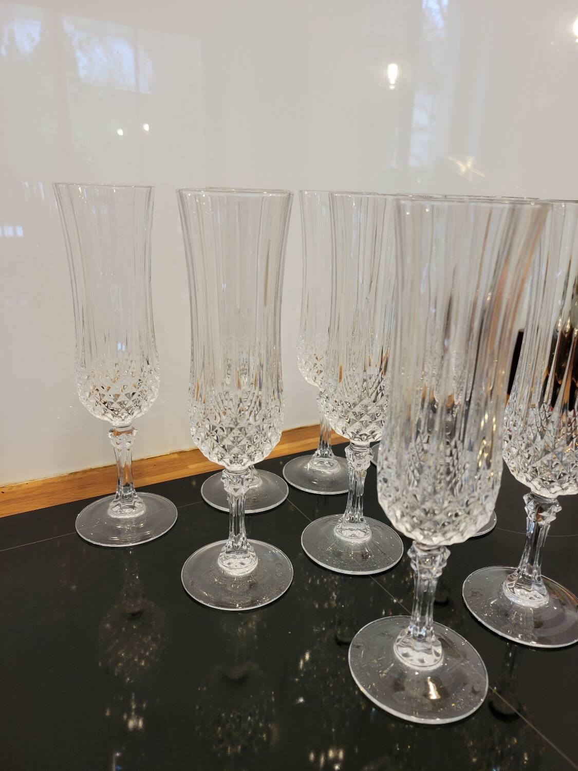 9 crystal champagne flutes from Arques model Longchamp