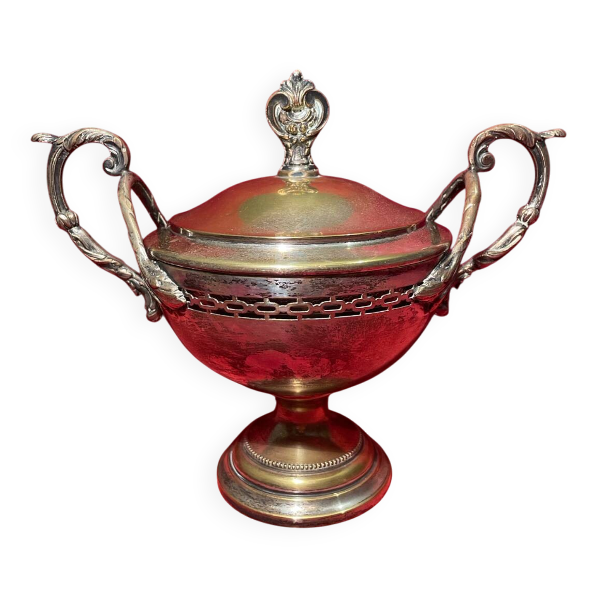 Antique sugar bowl on a stand with a lid and interior lining in velvet.