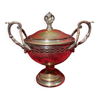 Antique sugar bowl on a stand with a lid and interior lining in velvet.
