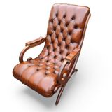 Pair of leather Chesterfields and footstools