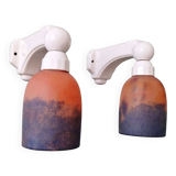 Pair of Art Deco wall sconces in multicoloured porcelain and frosted glass.