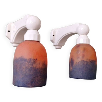Pair of Art Deco wall sconces in multicoloured porcelain and frosted glass.