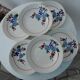 Set of six hollow plates "cap" in earthenware