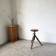 Tripod workshop stool in turned wood and cast iron — circa 1900