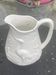 Carafe the heron in white glazed ceramic slipware.