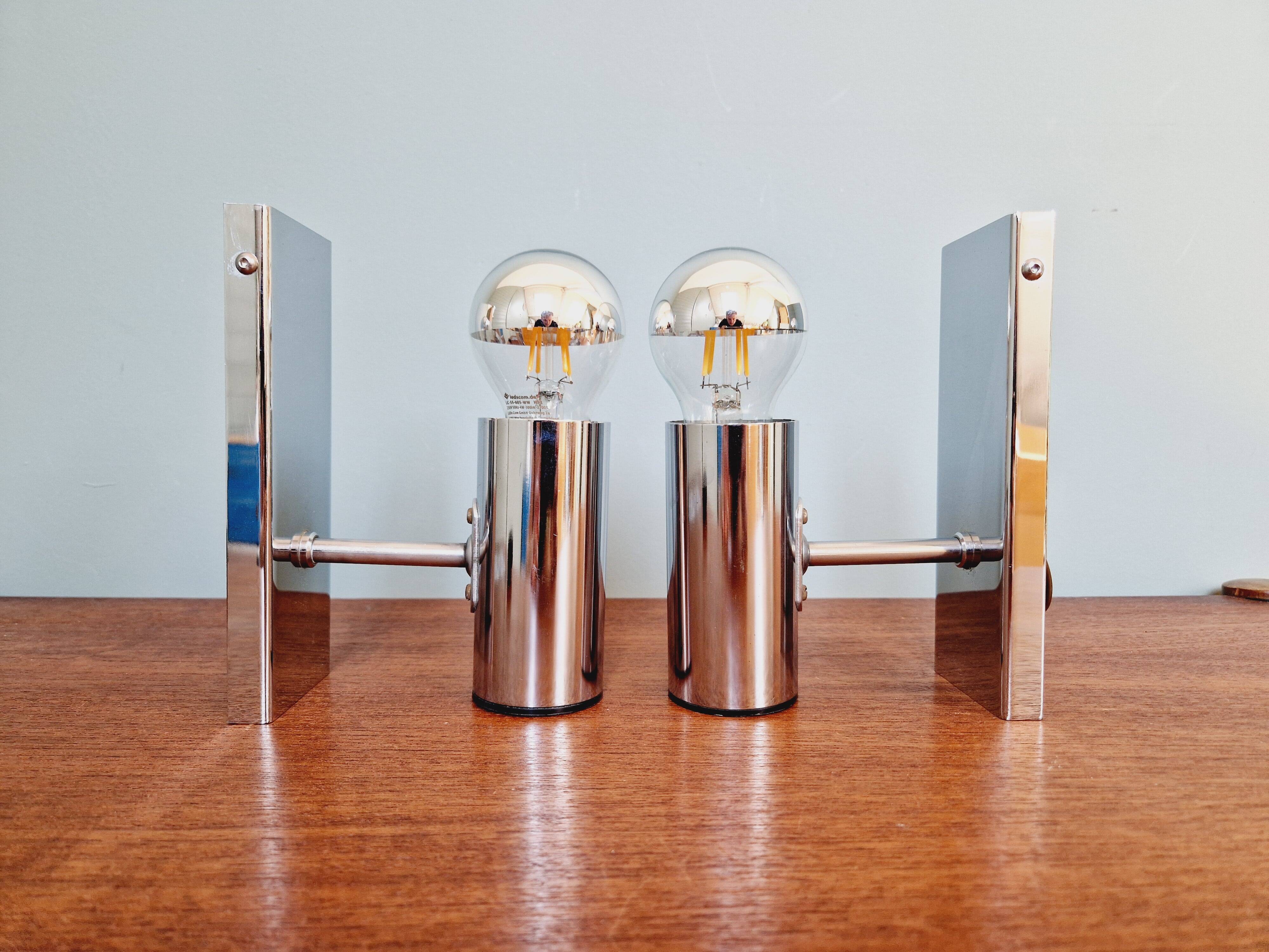 Pair of tubular chrome-plated metal wall sconces, 1970s