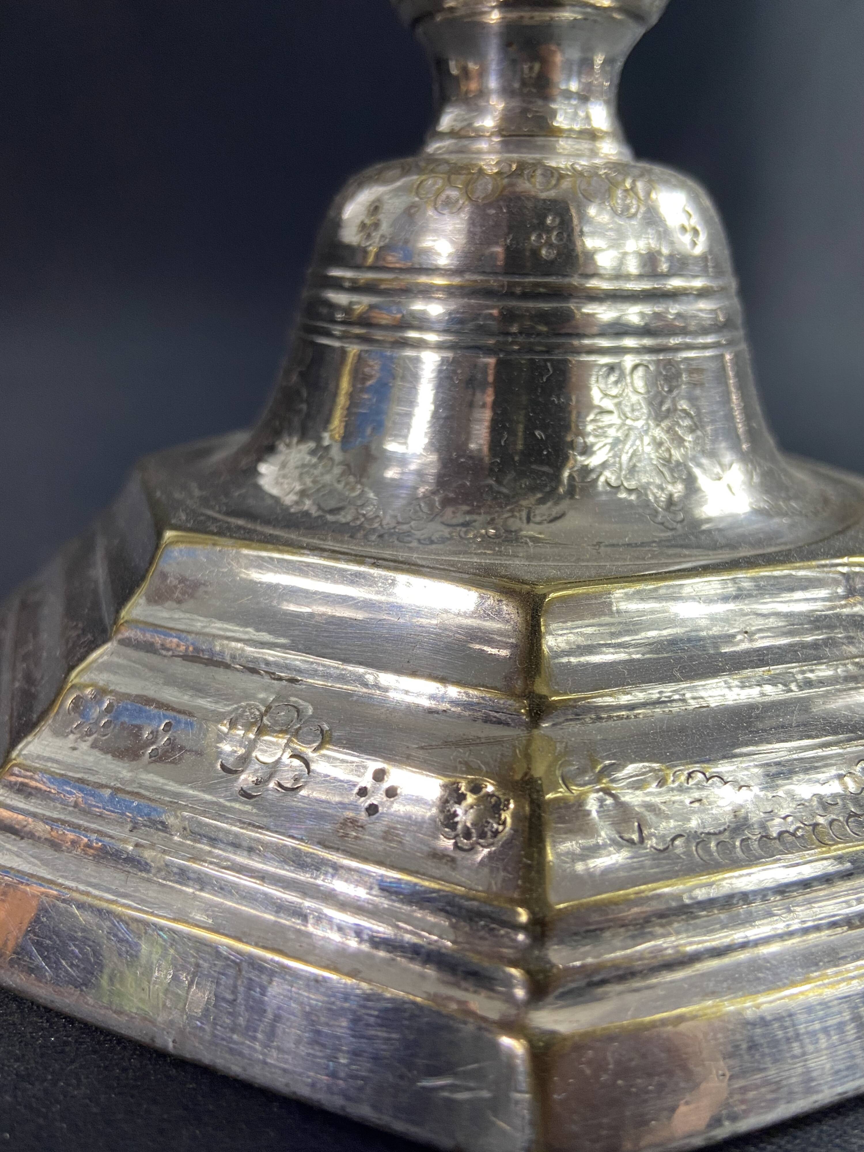 18th century Regency candlestick in silvered bronze with chiseled floral decoration