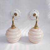 Swan neck and glass globe wall lights