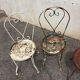 Mélange of vintage garden chairs