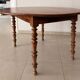 Round solid oak table with extensions, cabinetmaker's sliding mechanism,