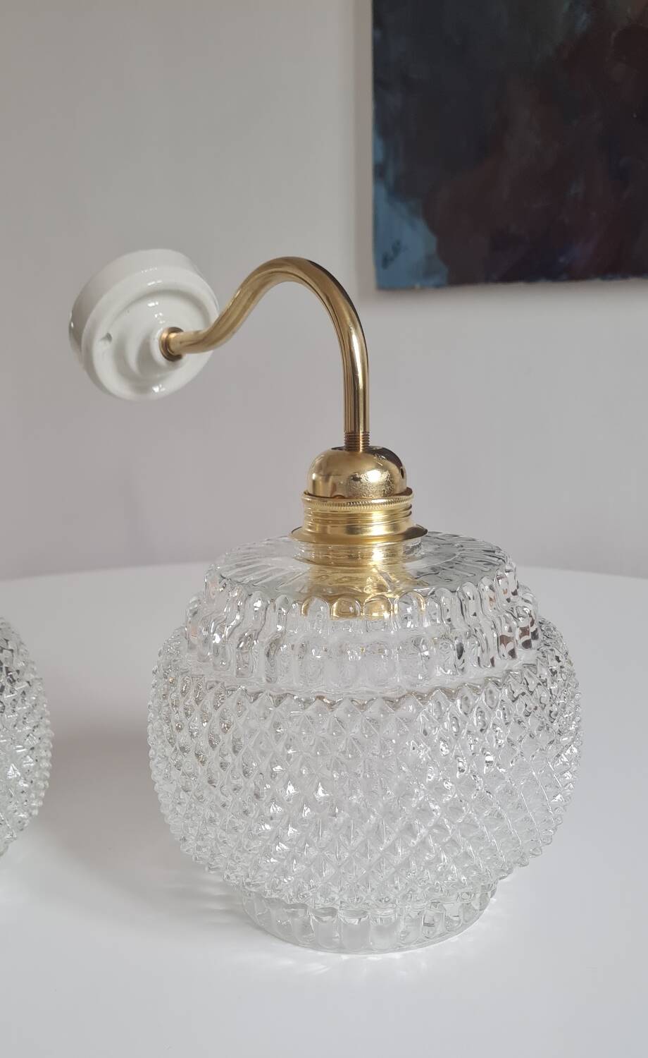 Pair of chiseled glass sconces