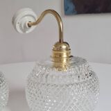 Pair of chiseled glass sconces