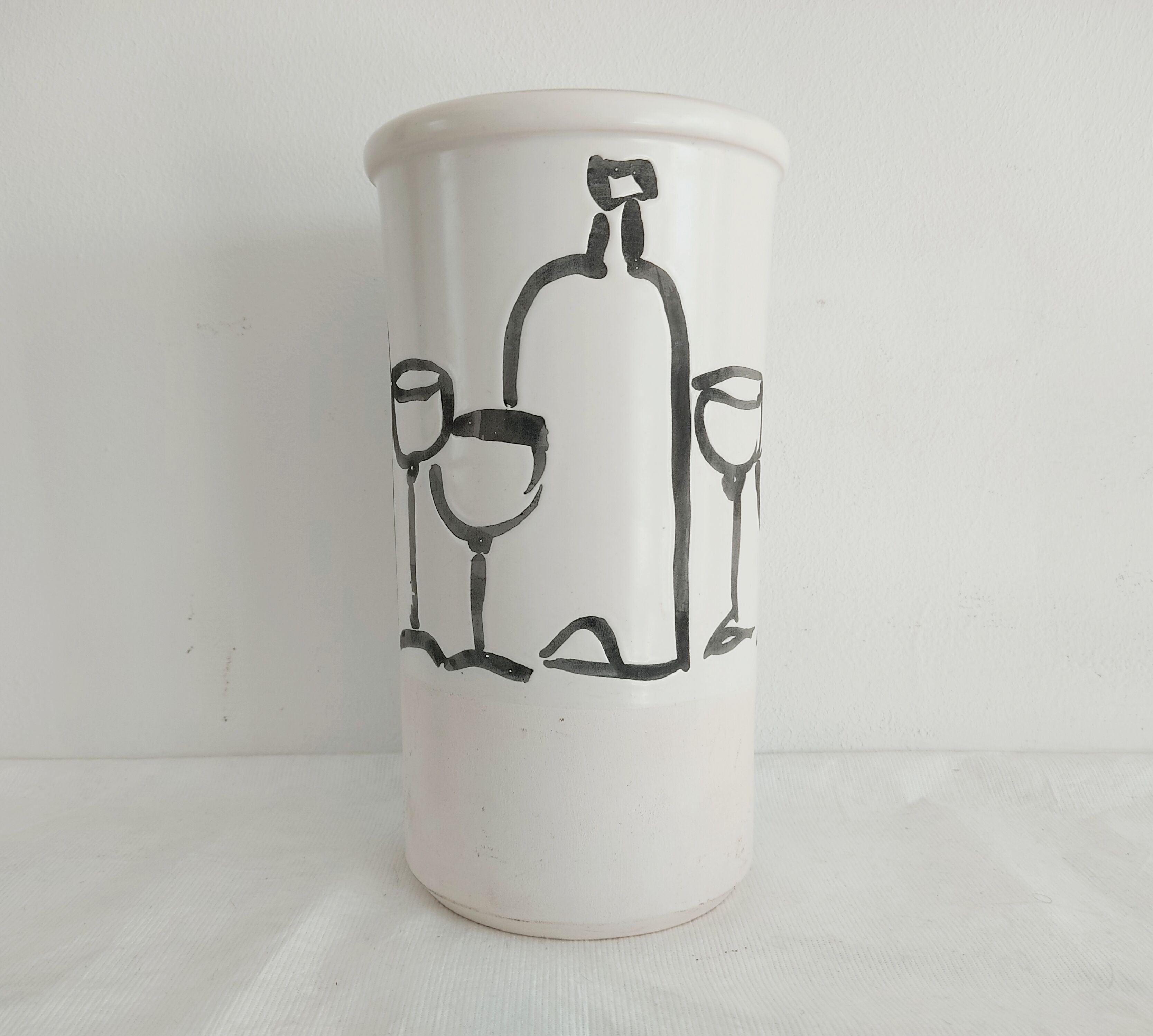 Vase decorated in hollows of bottles and glasses