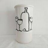 Vase decorated in hollows of bottles and glasses