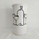 Vase with a relief design of bottles and glasses