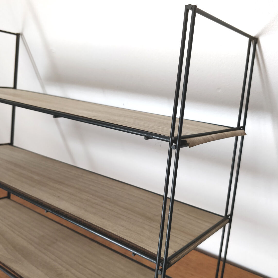Metal wall thong shelf