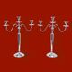 Pair of vintage three-armed chrome metal candlesticks