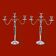 Pair of vintage three-armed chrome metal candlesticks