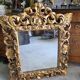 Miroir en bois dore a coquille
